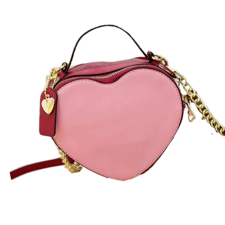 Sac à bandoulière pour femme style luxe design de marque célèbre en cuir PU avec cœur, sac à main populaire avec lettre ouverte pour la Saint-Valenti